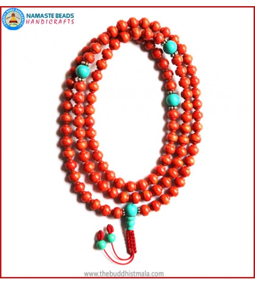 Carved Coral Mala with Turquoise Guru Bead