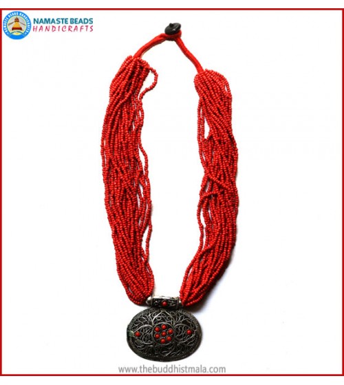 White Metal Pendant & Coral Necklace